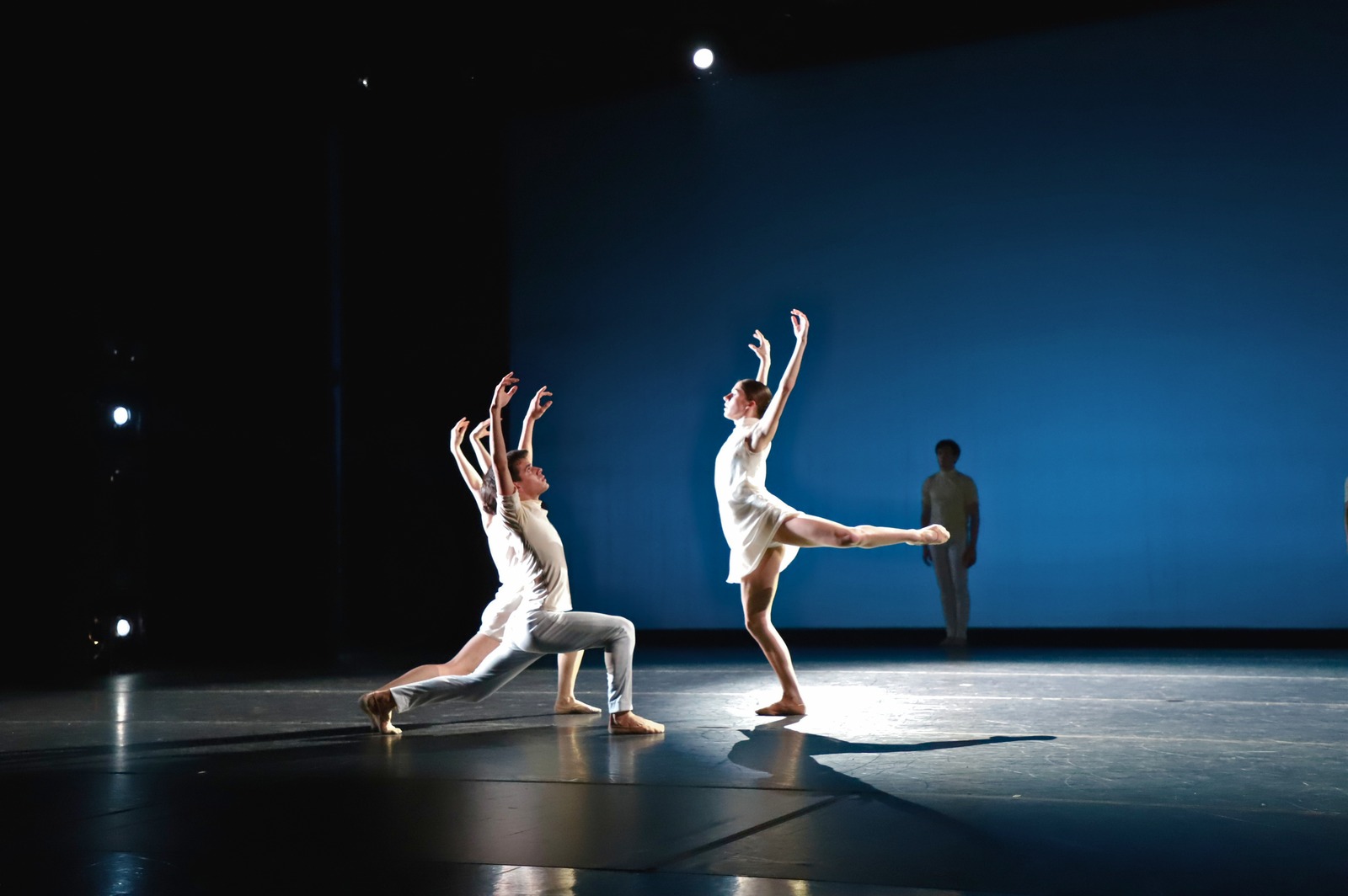 As We Journey Through — two dancers in white on stage