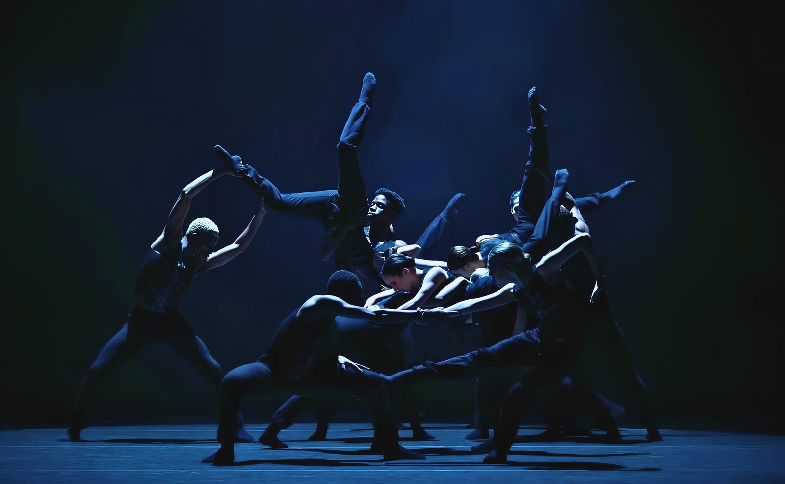 Portal — ensemble in a sculptural cluster on stage
