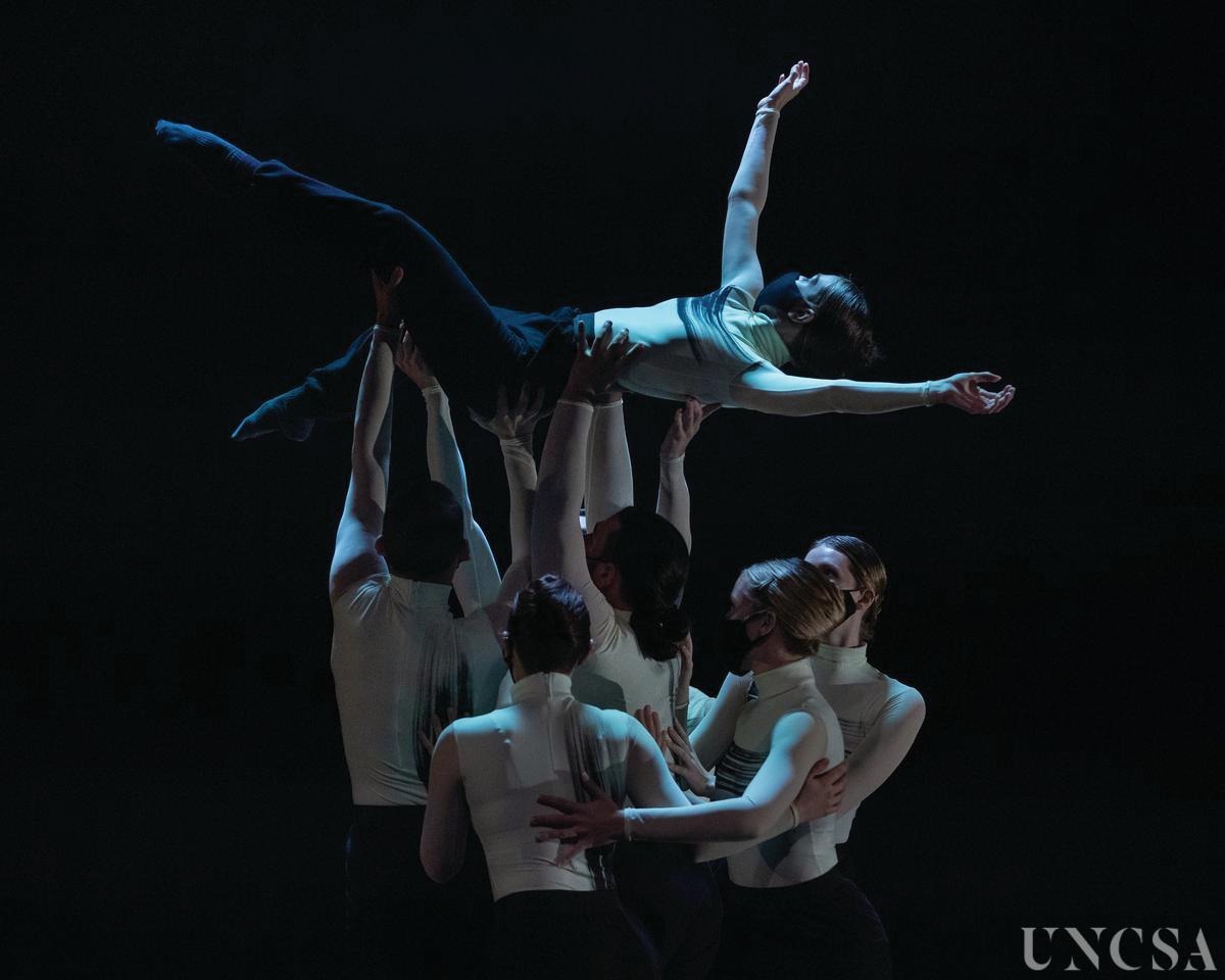 Somewhere in a Dream — dancer lifted mid-air