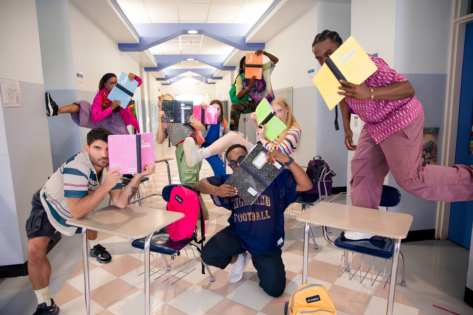 Back to Cool — students posing with school supplies