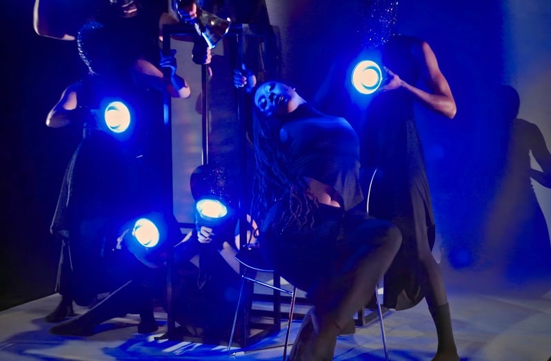 Gurl — dancers under blue stage lights
