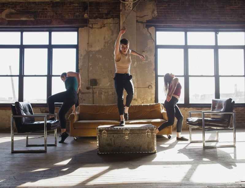 Triune — three dancers in an industrial loft